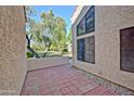 Inviting outdoor patio with brick pavers, ideal for relaxation and entertaining at 602 N May -- # 17, Mesa, AZ 85201
