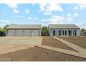 Spacious six-car garage with additional room for parking and storage at 9821 E Larkspur Dr, Scottsdale, AZ 85260