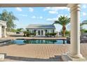 Inviting backyard oasis featuring a sparkling pool and lush landscaping at 9821 E Larkspur Dr, Scottsdale, AZ 85260