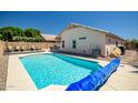 Refreshing backyard pool with a deck, perfect for relaxation and entertaining guests at 15558 N Ulrich Way, Surprise, AZ 85374