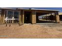 Exterior view of a new home under construction, showing the framing and garage at 32637 N Newby Dr, San Tan Valley, AZ 85143