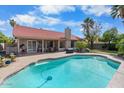 Backyard pool featuring a tile-trimmed pool and patio, perfect for outdoor living and entertaining at 11106 E Clinton St, Scottsdale, AZ 85259