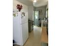 Functional kitchen layout with vintage appliances and ample counter space at 4410 N 50Th Dr, Phoenix, AZ 85031
