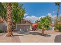 Charming single-Gathering home with a well-manicured lawn and mature trees at 10580 E Bella Vista Dr, Scottsdale, AZ 85258