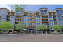 Attractive multi-story building with manicured landscaping and inviting entrance at 16 W Encanto Blvd # 305, Phoenix, AZ 85003