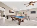Spacious game room featuring a pool table, shuffleboard, wet bar, and modern finishes at 1882 W Wildhorse Dr, Chandler, AZ 85286