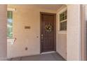 Close-up of the front door, adorned with a wreath and featuring unit number at 2519 N 73Rd Dr, Phoenix, AZ 85035