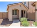 Inviting townhouse with covered entryway and a meticulously maintained front yard at 2519 N 73Rd Dr, Phoenix, AZ 85035