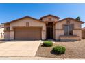 Inviting home featuring a well-maintained front yard, neutral paint scheme, and convenient two-car garage at 2732 E Tyson St, Chandler, AZ 85225