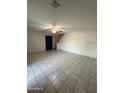 Entryway to this house featuring tile flooring and natural lighting at 4231 N 69Th Dr # 1297, Phoenix, AZ 85033