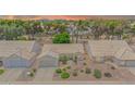 An aerial view of a well-maintained home showcases desert landscaping and a tile roof at 5283 W Dublin Ct, Chandler, AZ 85226