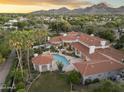 Beautiful home showcasing an expansive backyard with pool, gazebo, and mountain views at sunset at 8815 N 65Th St, Paradise Valley, AZ 85253