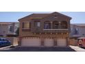 Multi-level condo building with three garages and decorative balconies at 2150 W Alameda Rd # 2037, Phoenix, AZ 85085