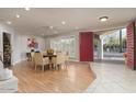 Dining room with a ceiling fan, modern light fixture, and views of the outdoors at 6408 E Gary Rd, Scottsdale, AZ 85254