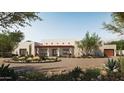 Stunning single story home featuring desert landscaping, a circular drive, stone accents and a covered entry at 13202 N 76Th Pl, Scottsdale, AZ 85260