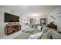 Open-concept living room leading into the dining area, perfect for entertaining guests at 15252 N 100Th St # 1134, Scottsdale, AZ 85260