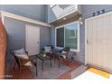Inviting outdoor patio featuring comfortable seating and a secure gated entrance at 2301 E University Dr # 233, Mesa, AZ 85213