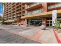 Exterior view of the building featuring the tower sign, entrance, and modern architecture at 4750 N Central Ave # G3, Phoenix, AZ 85012