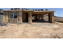 New home construction showing framing progress with wood studs, sheathing, and a partially completed roof structure at 9532 W Parkway Dr, Tolleson, AZ 85353