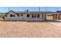 Charming single-story home with desert landscaping and covered parking at 126 N 58Th St, Mesa, AZ 85205