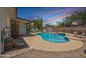 Refreshing private pool surrounded by desert landscaping, perfect for relaxing and entertaining guests at 500 E Hermosa Dr, Tempe, AZ 85282
