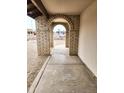 Welcoming entrance featuring an arched doorway leading to the house at 9601 N 35Th Dr, Phoenix, AZ 85051