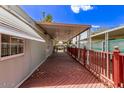 Expansive outdoor deck offering ample space for lounging and entertaining with covered area at 201 S Greenfield Rd # 331, Mesa, AZ 85206