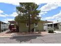Charming single story home with well-kept landscaping and covered entry at 201 S Greenfield Rd # 331, Mesa, AZ 85206
