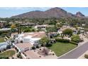 Sprawling estate with lush landscaping and mountain views at 6443 E Malcomb Dr, Paradise Valley, AZ 85253