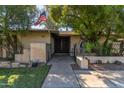 Inviting front entrance with decorative security door and flag at 8540 N 43Rd Dr, Glendale, AZ 85302