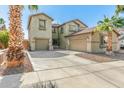 Charming two-story home featuring desert landscaping, and an attached two-car garage at 11580 N 145Th Ave, Surprise, AZ 85379