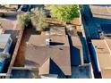Aerial view showcasing the home's roof, landscaping, and proximity to neighborhood streets at 1914 W Colter St, Phoenix, AZ 85015