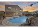 Gorgeous private pool with an outdoor patio and a lush landscape, perfect for outdoor relaxation at 23420 N 121St Ave, Sun City, AZ 85373