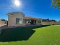 This backyard offers a well-maintained lawn area, perfect for relaxation and outdoor activities at 3840 E San Mateo Way, Chandler, AZ 85249