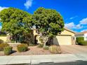 Charming home with mature trees, desert landscaping, and an attached two car garage at 3840 E San Mateo Way, Chandler, AZ 85249
