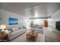 Bright living room featuring modern furniture, decor, and ample natural light, perfect for relaxation and entertainment at 5124 N 31St Pl # 514, Phoenix, AZ 85016
