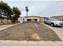 Shot of small one-story home featuring a mailbox and well maintained walkway at 639 S 92Nd Pl, Mesa, AZ 85208