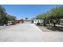 Lovely single-story house with a spacious driveway and desert landscaping at 7126 W Ocotillo Rd, Glendale, AZ 85303