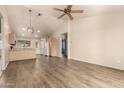 Open concept living area with vaulted ceilings, new flooring and plenty of natural light at 860 N Mcqueen Rd # 1157, Chandler, AZ 85225
