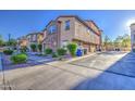 Street view of the lovely two-story home with stucco exterior, stone accents, and attached garage at 1624 N 77Th Gln, Phoenix, AZ 85035