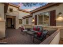 Cozy patio area with comfortable seating, ideal for enjoying outdoor living at 24121 N 24Th Pl, Phoenix, AZ 85024