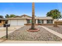Inviting home exterior with mature landscaping, double garage, and easy access at 3337 W Yucca St, Phoenix, AZ 85029