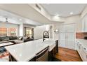 Modern kitchen showcasing a large island with a sink and stainless steel dishwasher at 3935 E Rough Rider Rd # 1016, Phoenix, AZ 85050