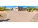 Spacious home with large paved driveway and an attached two car garage at 5515 E Dale Ln, Cave Creek, AZ 85331