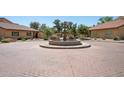Charming fountain feature nestled within the community, enhancing the serene atmosphere at 8414 N Central Ave # B, Phoenix, AZ 85020