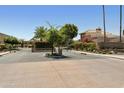 Community gate features a landscaped entrance at 9484 N 105Th Pl, Scottsdale, AZ 85258
