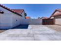 Spacious paved backyard providing ample space for outdoor activities and low-maintenance landscaping at 2940 E Norwood St, Mesa, AZ 85213