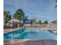 Relax by the community pool with shaded cabanas, perfect for enjoying sunny days at 441 S Maple -- # 83, Mesa, AZ 85206