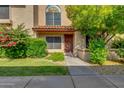 Charming townhome with a beautiful yard, lush greenery, and lots of curb appeal at 4901 E Kelton Ln # 1052, Scottsdale, AZ 85254