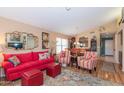 Comfortable living room with plush seating, stylish decor, and hardwood flooring at 17342 E Quail Ridge Dr, Fountain Hills, AZ 85268